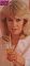 Elegant Wendy Richard holding champagne flute